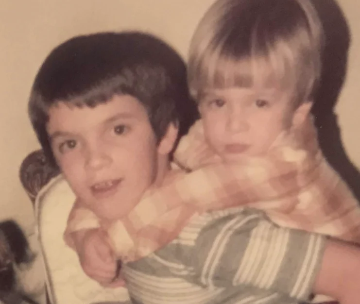 Chad and Darren Elkins as children, the brothers behind New Leaf Home Buyers